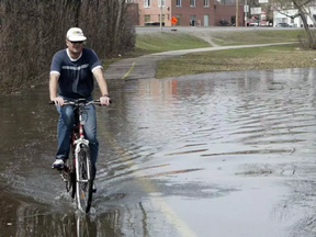 Some flood-damaged NCC paths will take almost a year to repair. (File photo, Postmedia)