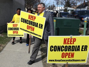 Jim Maloway (centre), the NDP MLA for Elmwood, organized a group of people rallying to save the Concordia Hospital emergency room outside the Elmwood Curling Club on Sun., April 23, 2017. Kevin King/Winnipeg Sun