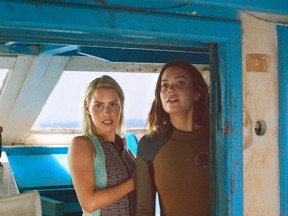Claire Holt, left, and Mandy Moore star in "47 Metres Down." (Handout)
