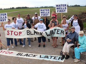 Members of Water Wells First held an information picket near where an industrial wind turbine will be erected on Darrell Line north of Chatham, Ont. on Thursday June 22, 2017. (Ellwood Shreve/Chatham Daily News)