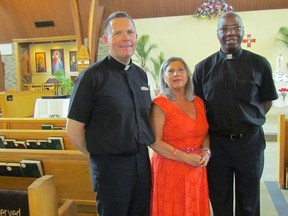 Standing in the chapel at St. Benedict's Roman Catholic Church Thursday, June 22, 2017 in Sarnia, Ont., are from left, Rev. Stephen Savel, pastoral minister Lee Downie and Rev. Augustine Ogundele. The church will host a visit by the relics of Saints Louis and Zelie Martin Saturday, with prayers and other services during the day. (Paul Morden/Sarnia Observer)