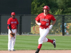 Brock Kjeldgaard runs the bases after hitting a home run during the Team Canada-Colombia game on Sunday July 12, 2015. (Postmedia Network file photo)
