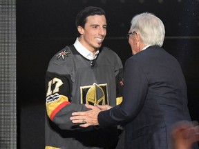 Goaltender Marc-Andre Fleury shakes hands with owner Bill Foley of the Vegas Golden Knights after being taken in the expansion draft at T-Mobile Arena on June 21, 2017 in Las Vegas. (Ethan Miller/Getty Images)