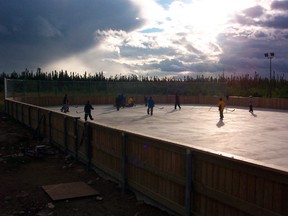 Residents play hockey on the Wapekeka First Nation - northwest of Thunder Bay. (POSTMEDIA NETWORK/FILES)