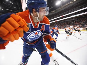 Edmonton Oilers right wing Jordan Eberle battles for the puck in the corner during NHL action against the Philadelphia Flyers in Edmonton on Feb. 16, 2017. (THE CANADIAN PRESS/Jason Franson)