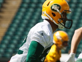 Wide receiver Nate Behar (left) runs a drill during Edmonton Eskimos practice at Commonwealth Stadium in Edmonton, Alberta on Thursday, June 22, 2017.