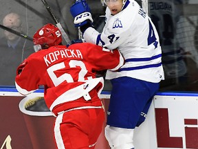 Nicolas Hague of the Mississauga Steelheads takes a hit from Jack Kopacka of the Sault Ste. Marie Greyhounds during game action on Nov. 25, 2016 at Hershey Centre. (Graig Abel/Getty Images)