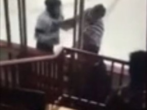 In this screengrab of a video obtained by The Guardian PEI, Sherwood Falcon AA midget player Cole Trevor Crane is seen throwing punches at referee John William MacDougall on March 26, 2017. (Credit: The Guardian PEI)
