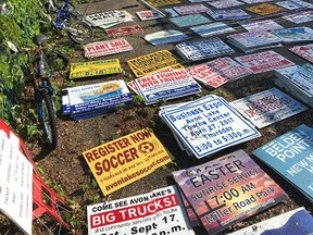 An Ohio man is facing charges after police say he stole more than 500 signs, claiming they were an eyesore and a distraction to drivers. (Avon Lake Police Department/Facebook photo)