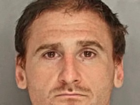 This photo provided by the Pennsylvania Attorney General's Office shows Michael Marchalk, charged with murder in the death of his father Gary Marchalk. Pennsylvania State Police say in a complaint filed Wednesday, June 21, 2017, that Gary Marchalk, an attorney found dead in the home of his estranged wife Linda Marchalk, treasurer of Schuylkill County, Pa., was fatally beaten with a bat by his son Michael Marchalk on Father's Day, Sunday, June 18, 2017.
(Pennsylvania Attorney General's Office via AP)