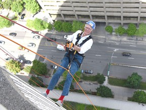 Dr. Gifford-Jones, who is 93, was among those who descended from the top of Toronto’s City Hall on a rope on June 9. It was a for a good cause, the WISH Grantors for Make-A-Wish Canada. (Gordon Cheong photo)