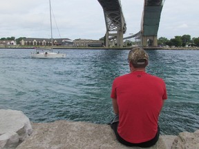 A sailboat on the St. Clair River is shown in this file photo approaching the Blue Water Bridge connecting Point Edward with Port Huron. Mich. Sarnia-Lambton MP Marilyn Gladu said legislation passed this week in Ottawa is expected to ease reporting requirements for boaters in border areas. (File photo/Sarnia Observer/Postmedia Network)