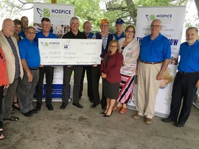 Members of the Rotary Club of Kingston-Frontenac present a donation of $100,000 to Hospice Kingston toward he construction of a new palliative care centre in Kingston. (Elliot Ferguson/The Whig-Standard)