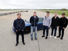 Left to Right: Winnipeg Jets Josh Morrissey, Mark Scheifele, Kyle Conner and Jack Roslovic were able to enjoy a Porsche Experience (Porsche 911) with professional race car driver David Richert (second from left) at the Gimli Motorsport Park in Gimli, Man., on Friday, June 23, 2017. The event was being run in conjunction with the Mark Scheifele Golf Tournament in support of KidSport Winnipeg. (Brook Jones/Interlake Spectator/Postmedia Network)