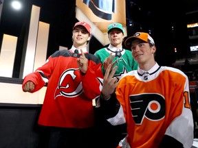 Nico Hischier, Miro Heiskanen, and Nolan Patrick pose for photos after being selected during the 2017 NHL Draft at the United Center on June 23, 2017 in Chicago, Illinois. (Bruce Bennett/Getty Images)