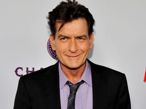In this April 2013 file photo, Charlie Sheen, a cast member in "Scary Movie V," poses at the Los Angeles premiere of the film at the Cinerama Dome in Los Angeles.(Photo by Chris Pizzello/Invision/AP, file)