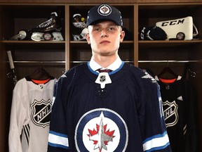 Kristian Vesalainen poses for a portrait after being selected 24th overall by the Jets during the 2017 NHL Draft at the United Center in Chicago on Friday, June 23, 2017. (Stacy Revere/Getty Images)