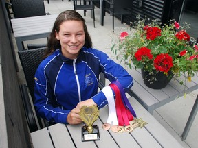 Amy Lacelle, 12, displays the hardware she won as a member of Sudbury Synchronized Swimming Club. Lacelle was named to Team Ontario to compete at nationals in Edmonton in July. Laura Young/For The Sudbury Star