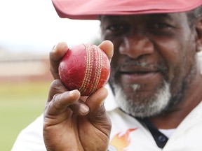 Coach/player Barrington Pitters, of the Sudbury Warriors, displays a cricket ball. John Lappa/Sudbury Star/Postmedia Network