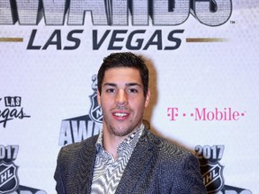 Travis Hamonic of the New York Islanders poses with the NHL Foundation Player Award during the 2017 NHL Humanitarian Awards at Encore Las Vegas on June 20, 2017 in Las Vegas, Nevada. (Photo by Bruce Bennett/Getty Images)
