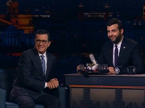 Stephen Colbert, left, sat down with Russian late-night show "Evening Urgant" host Ivan Urgant on Friday. (screengrab)
