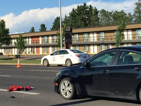 Edmonton Police Service officers investigate a collision involving a pedestrian at Gateway Boulevard and 38 Avenue on Saturday, June 24, 2017. Catherine Griwkowsky/Postmedia/Edmonton Sun