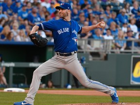 J.A. Happ of the Toronto Blue Jays throws in the first inning against the Kansas City Royals at Kauffman Stadium on June 23, 2017 in Kansas City, Missouri. (ED ZURGA/Getty Images)