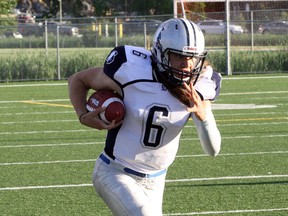 Sudbury Spartans defensive back Konnor Gills returns an interception against the North Bay Bulldogs at James Jerome Sports Complex on Saturday, June 24, 2017. Sudbury won 21-1. The Spartans honoured their four newest inductees into the Northern Football Conference Hall of Fame -- Dave Janakowski, Terry Huhtala, and the late John Laban and Frank Pagnucco -- during a halftime ceremony. Ben Leeson/The Sudbury Star/Postmedia Network