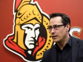 Ottawa Senators coach Guy Boucher leaves a wrap up press conference i n Ottawa on Monday, May 29, 2017. (THE CANADIAN PRESS/Justin Tang)