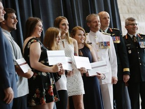 (L-R) Kristopher Beerenfenger, Maude Mercier, Sarah Stewart, Chelsey Hendrickson and Keira Mitchell received $4,000 scholarships from the Canada Company Scholarship Fund at City Hall in Ottawa, on Friday.
