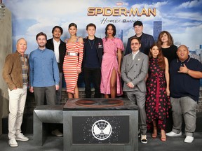 (L-R) Michael Keaton, Jon Watts, Tony Revolori, Zendaya, Tom Holland, Laura Harrier, Robert Downey Jr., Kevin Feige, Marisa Tomei, Amy Pascal and Jacob Batalon attend the "Spider-Man: Homecoming" Photo Call at the Whitby Hotel on June 25, 2017 in New York City. (Photo by Rob Kim/Getty Images)