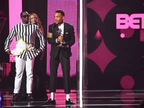 Diddy (L) presents Chance The Rapper the award for Best New Artist onstage at 2017 BET Awards at Microsoft Theater on June 25, 2017 in Los Angeles, California. (Photo by Paras Griffin/Getty Images for BET)