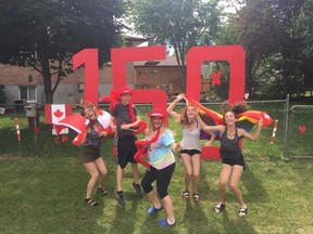 Brian Melady and his spouse Vicki Powers have recently moved to Kingston Ont. The two made a massive Canada 150 sign and invited people from the neighbourhood on their new property to take photos with props for the country’s special celebration. (Submitted photo)