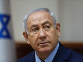 Israeli Prime Minister Benjamin Netanyahu attends the weekly cabinet meeting at his office in Jerusalem, Sunday, June 25, 2017. (Ronen Zvulun, pool via AP)