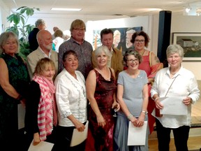 Submitted photo
Artist winners gather at the annual Art In The County Juried Exhibition and Sale. Pictured are (back row left to right — jurors award winners) - SaraLou Miller, Graham Davies, Tom Ashbourne, Roderick Samuel, Lesley Snyder. In the front row (left to right) gathered the honourable mention winners Kato Wake, Caroline Shuttle, Andrea Piller, Pauline Dinham and (far right) the 2017 Otto Rogers Award for Excellence, Buffy Carruthers.