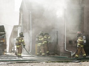 Firefighters work to put out a fire at 73 Street and 101 Avenue on June 25, 2017. JASON FRANSON/Postmedia