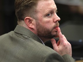 In this May 22, 2017, file photo, Michael McCarthy watches as jury selection begins for his murder trial in Suffolk Superior Court in Boston. McCarthy was convicted Monday, June 26 of second-degree murder in the death of Bella Bond who became known as Baby Doe after her remains washed up on the shores of a Boston Harbor island. (Pat Greenhouse/The Boston Globe via AP, Pool, File)