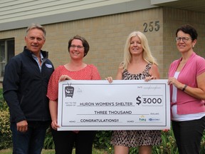 (Left to right): Glen Grubb, General Manager at HuronTel; Donna Jean Forster-Gill, Executive Director of Huron Women's Shelter; Kelli Phillips, Marketing Director at Hay Communications; Angela Lawrence, General Manager at Hay Communications.