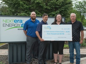 (Left to right): Michael Blackmore, Wind Site Manager at NextEra Energy Canada; Derek Dudek, Senior Technical Services Specialist at NextEra Energy Canada; Deborah Logue, Executive Director at Victim Services Huron; Jim Dietrich, Board Chair at Victim Services Huron.