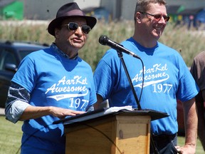 AarKel owner Iqbal Kassam and president Larry Delaey talk at AarKel's 40thanniversary celebration held on Saturday.