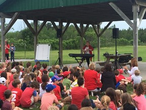 Submitted photo
Local singer and songwriter Jeanette Arsenault performed for more than 500 Murray Centennial School students earlier this month. Arsenault will perform her song, This Is My Canada/Mon cher Canada, during Canada Day celebrations in Belleville.