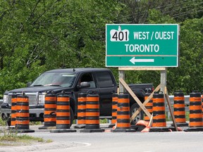 Construction cones are in place at the  Hwy. 401 westbound entrance ramp at Highway 15. The Ontario Road Builders’ Association recently released a  survey on drivers' habits when entering a highway construction zones. (Ian MacAlpine /The Whig-Standard)