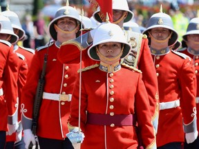 Captain Megan Couto (C) of the 2nd Battalion, Princess Patricia's Canadian Light Infantry (PPCLI) leads her battalion to makes history as the first female infantry officer to command the Queen's Guard at Buckingham Palace in central London on June 26, 2017. (JOHN STILLWELL/AFP/Getty Images)