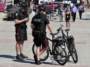 Black and indigenous Edmontonians are more likely to be stopped and "carded" by police, a practice that local activists call racial profiling but city police say helps suppress crime and assist in investigations. John Lucas/Postmedia