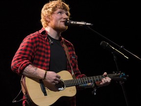 Ed Sheeran performs on the Pyramid Stage at the Glastonbury Festival of Music and Performing Arts on Worthy Farm near the village of Pilton in Somerset on June 25, 2017. (OLI SCARFF/AFP/Getty Images)