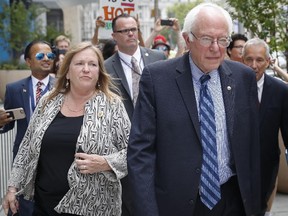 Sen. Bernie Sanders and his wife Jane O'Meara Sanders have hired lawyers in the face of federal investigations into the finances of the now-defunct Burlington College, which closed last year due to debts incurred when Jane Sanders entered into an ill-advised real estate deal. (John Minchillo/AP Photo/Files)