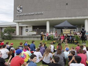 Teacher Hannah Roth speaks to the crowd of Grade 7 and 8 students, along with representative from the Pittsburgh Community Benefit Fund, at the La Salle Intermediate and Secondary School's new Makerspace Fair ribbon cutting ceremony in Kingston. (Julia McKay/The Whig-Standard)