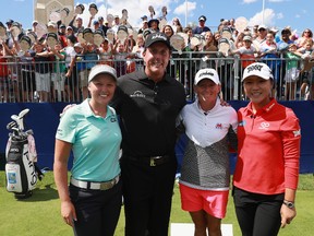 From left, Brooke Henderson, Phil Mickelson, Stacy Lewis and Lydia Ko pose together prior to the start of the KPMG Women’s PGA Championship in Olympia Fields, Ill., on June 26, 2017. (Getty Images)