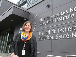 Dr. Janet McElhaney, vice-president of research and scientific director at Health Sciences North, poses for a photo at the grand opening of the Health Sciences North Research Institute on Monday. (Gino Donato/Sudbury Star)