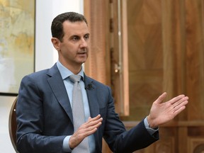 The White House says it has found "potential" evidence that Syrian President Bashar Assad is preparing for another chemical weapons attack. (SANA via AP/File)